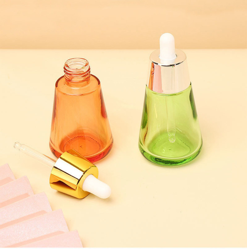 Industrial Cosmetic Elegant 30ml 50ml 1oz 2oz Green Empty Oil Serum Dropper Bottles with Box Customize Unique Cone Shape